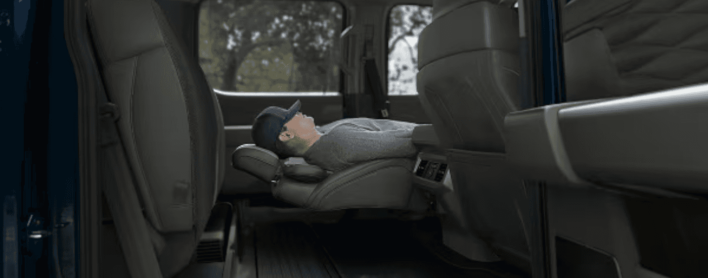 A person resting in a 2026 Ford F-350