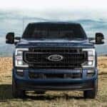 Blue 2021 Ford F-250 Super Duty parked on grass