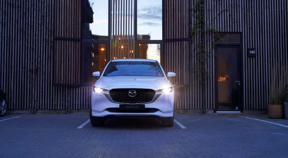 White 2022 Mazda CX-5 backed into a parking spot