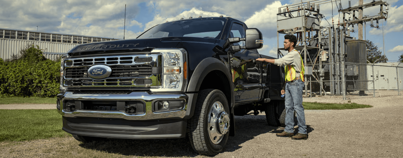 A person gets into a black 2026 Ford F-450