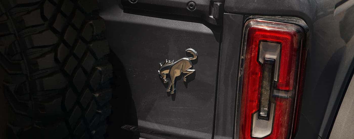 Close up of the rear badge on a grey 2026 Ford Bronco