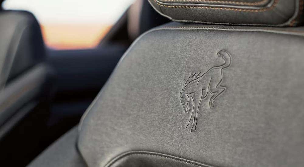 Badging on the black leather seats of a 2026 Ford Bronco