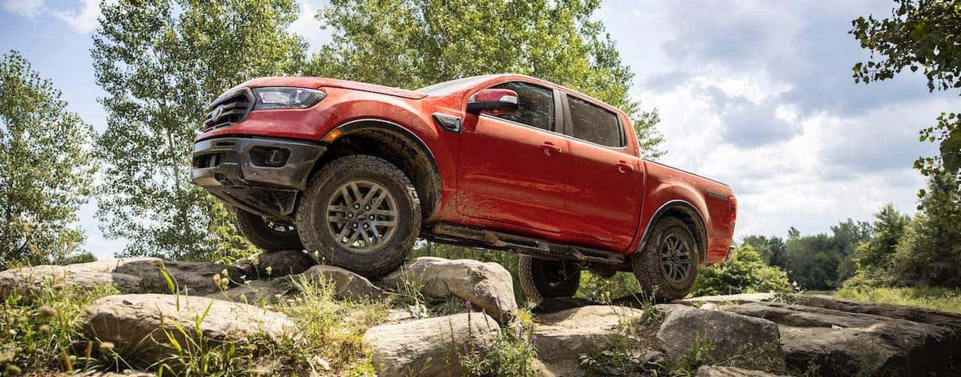 Red 2021 Ford Ranger Tremor parked off-road.