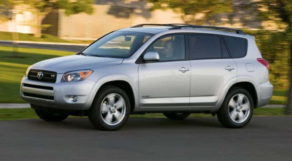 A silver 2009 Toyota RAV4 driving to a used car dealer near Amsterdam.