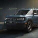 A blue 2026 Ford Bronco Sport parked in a garage.