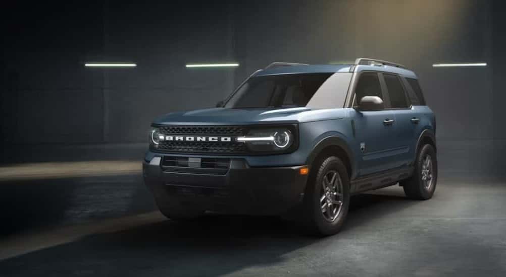 A blue 2026 Ford Bronco Sport parked in a garage.