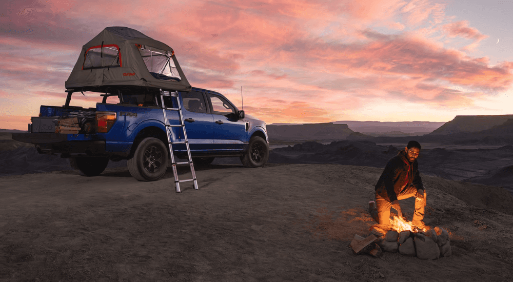 Blue 2026 Ford F-150 on a campsite