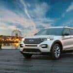 A white 2024 Ford Explorer parked on a dock.