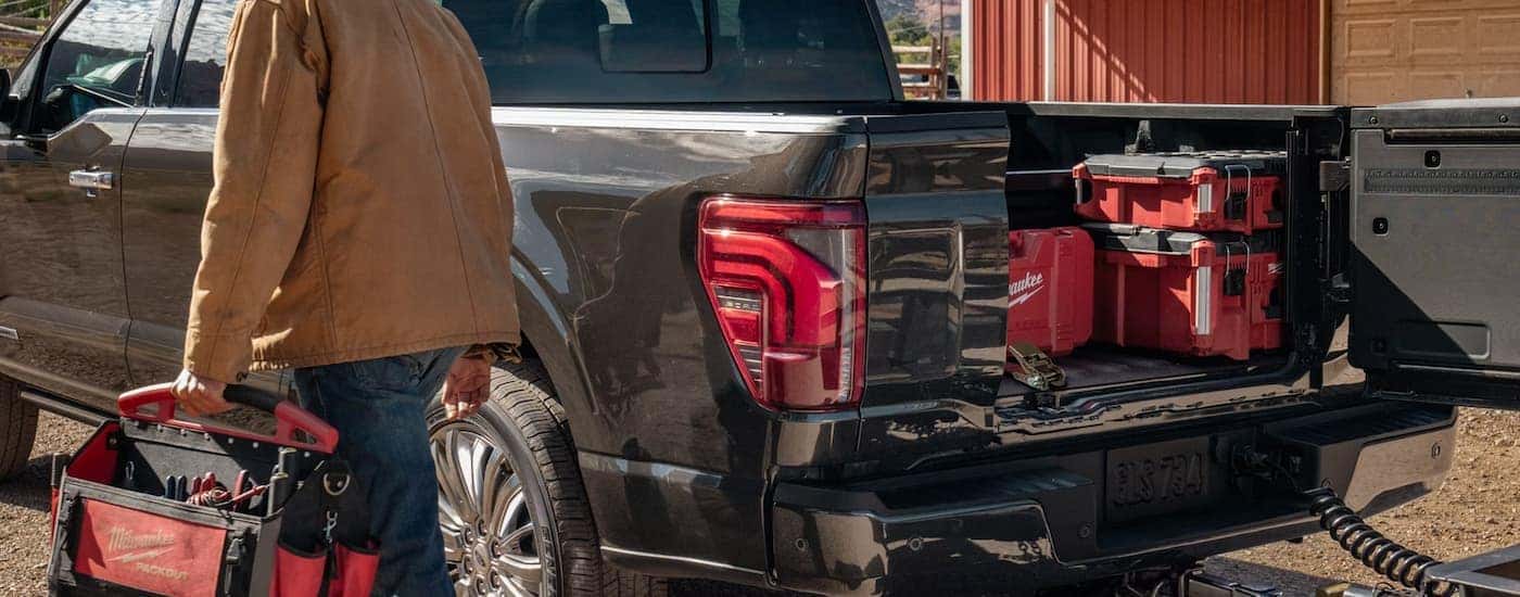 Tools in the truck bed of a gray 2026 Ford F-150