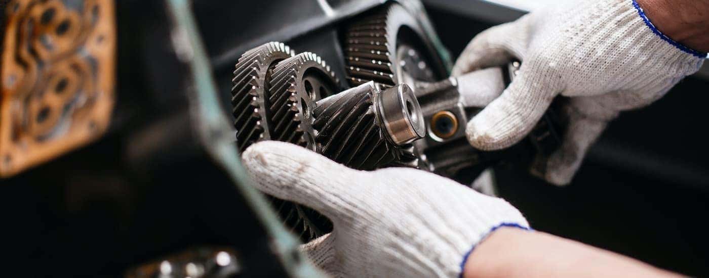 Mechanic fixing a vehicle's transmission
