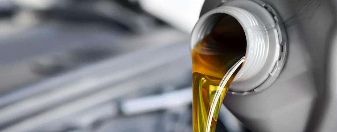 Oil being poured from a canister.