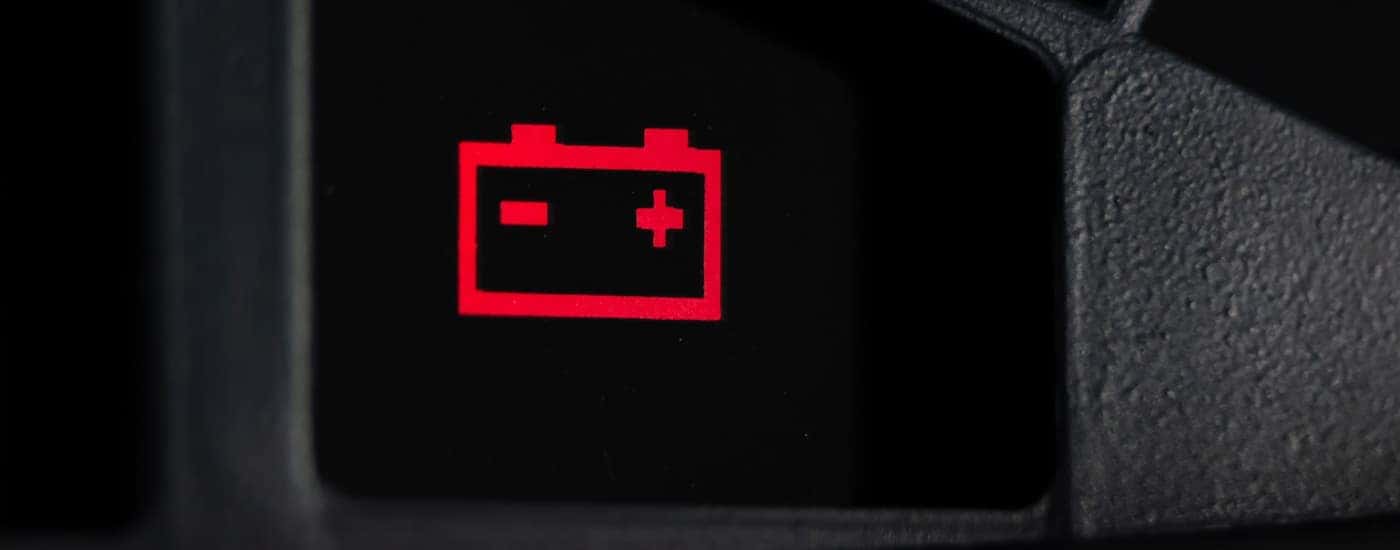 Check engine light on a vehicle dashboard