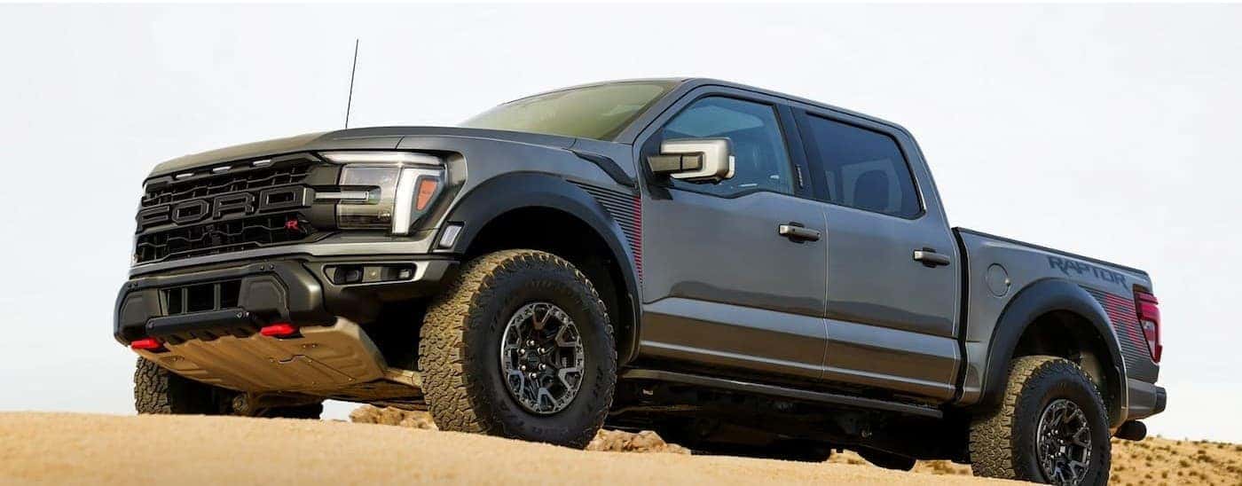 A gray 2026 Ford F-150 Raptor off-road.