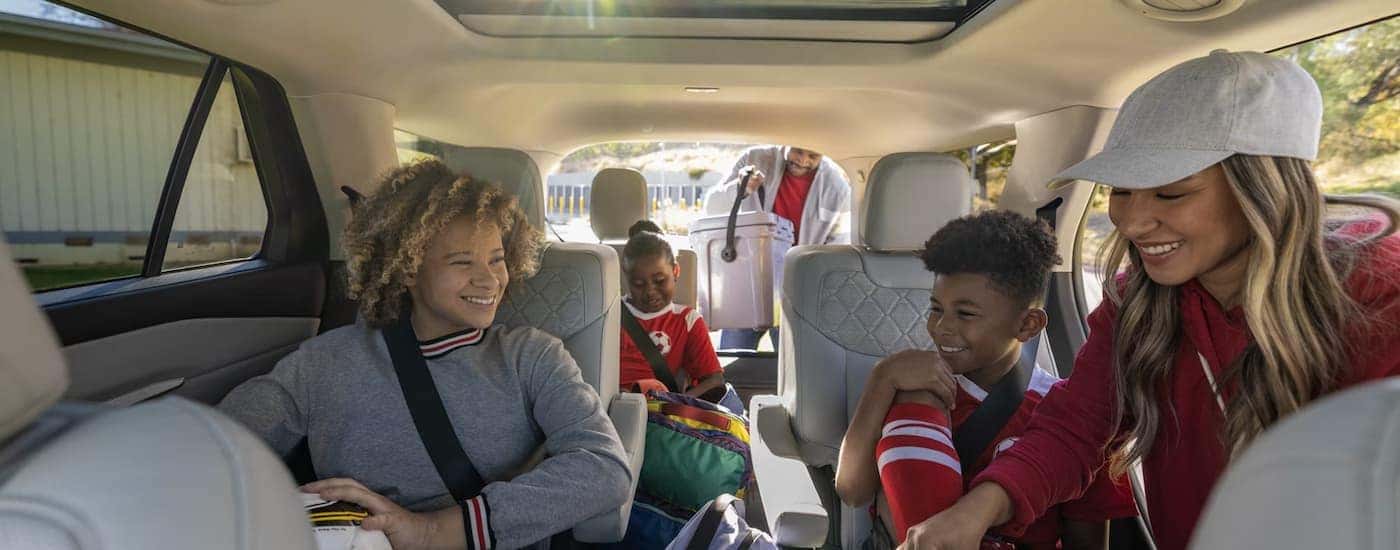 A family sitting inside a 2026 Ford Explorer