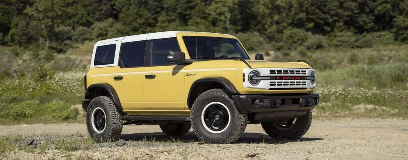 A yellow 2024 Ford Bronco Heritage Limited Edition shown from the side.