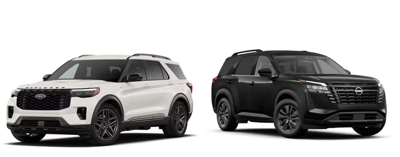 A white 2026 Ford Explorer vs a black 2026 Nissan Pathfinder