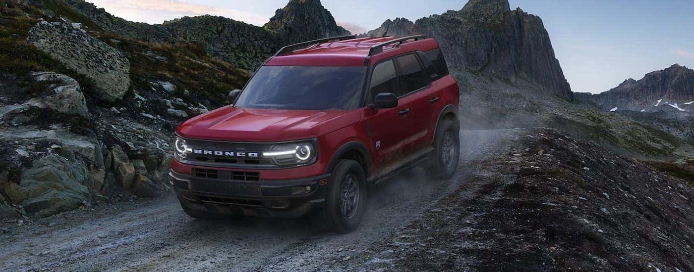 Red 2022 Ford Bronco Sport Big Bend driving along a trail
