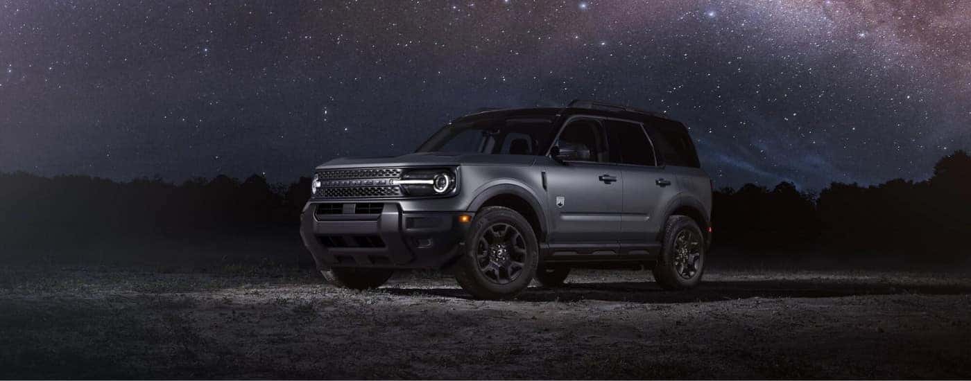 A grey 2025 Ford Bronco Sport Big Bend under a starry sky.