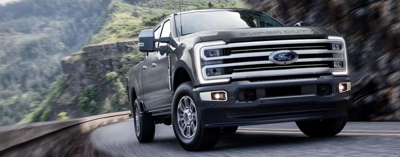 A gray 2026 Ford F-350 driving down a highway