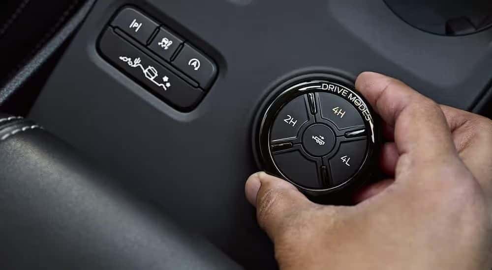 A person turning the Drive Mode knob in a 2026 Ford Ranger.
