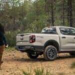 A tan 2026 Ford Ranger Sport 4X4 parked in the woods.