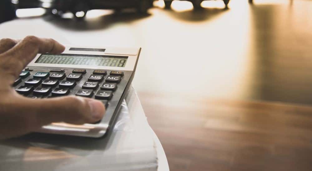 A calculator placed on a table.