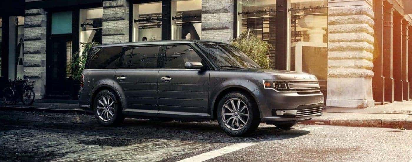 Grey 2018 Ford Flex parked on the corner of a street.
