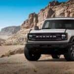 A white 2026 Ford Bronco Big Bend parked offroad.