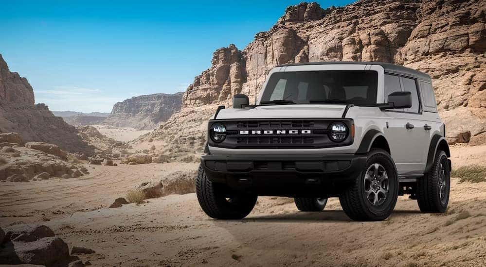 A white 2026 Ford Bronco Big Bend parked offroad.