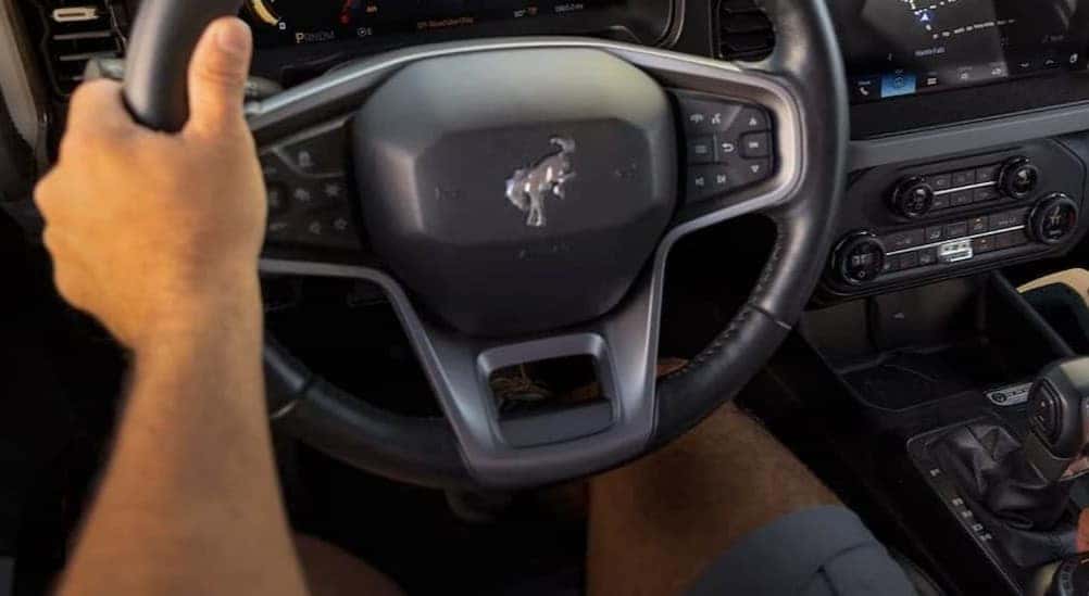 Black steering wheel in a 2026 Ford Bronco.