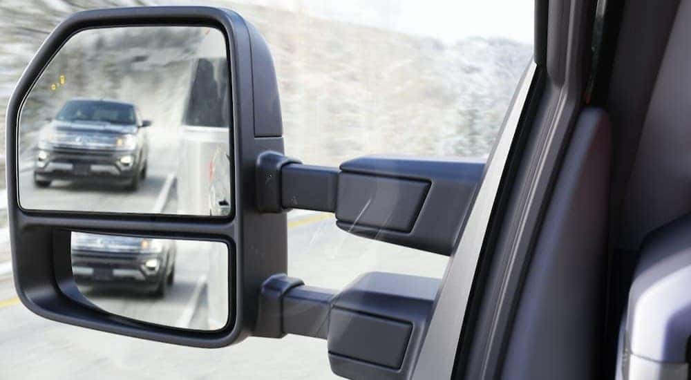 A tow mirror on a 2026 Ford F-150 Lariat.