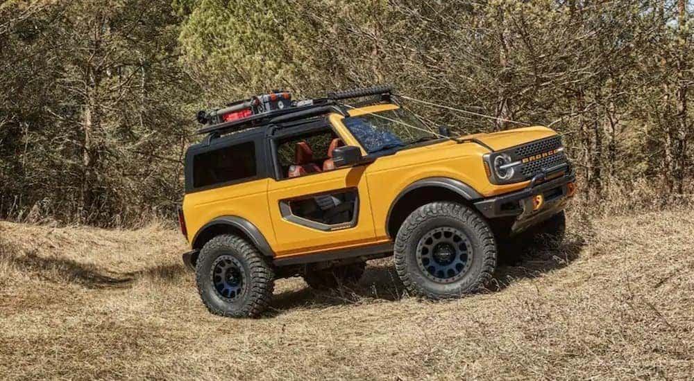A yellow 2021 Ford Bronco offroad.