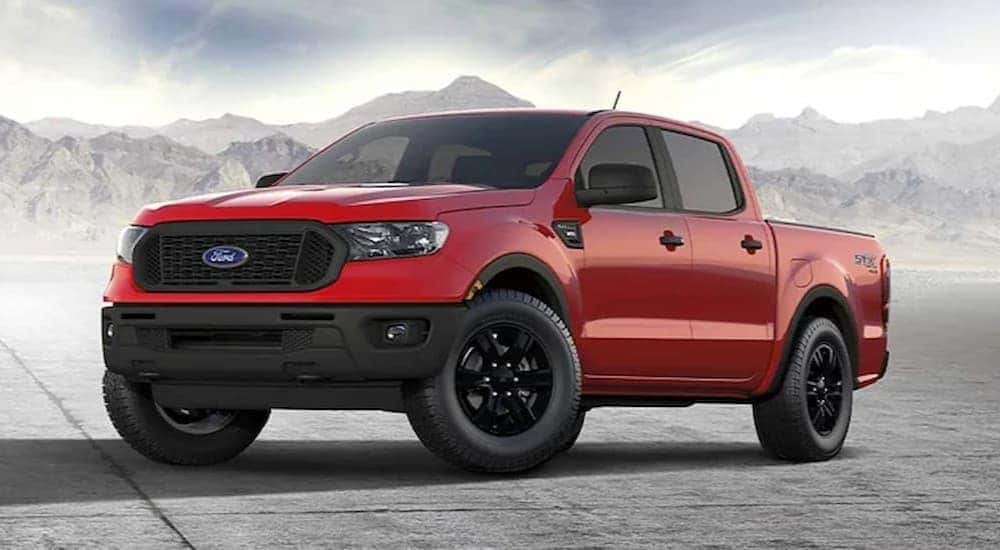 A red 2023 Ford Ranger parked outdoors.