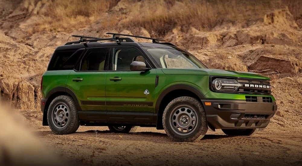 A green 2023 Ford Bronco Sport parked offroad.