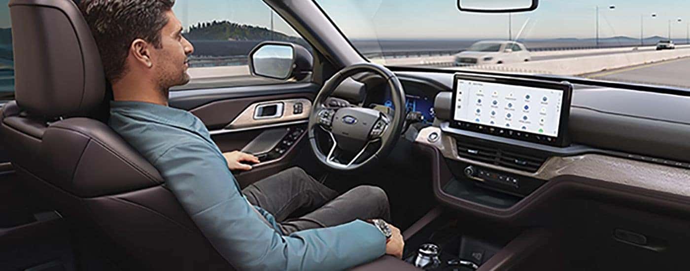 A man using BlueCruise to operate his 2027 Ford Explorer.