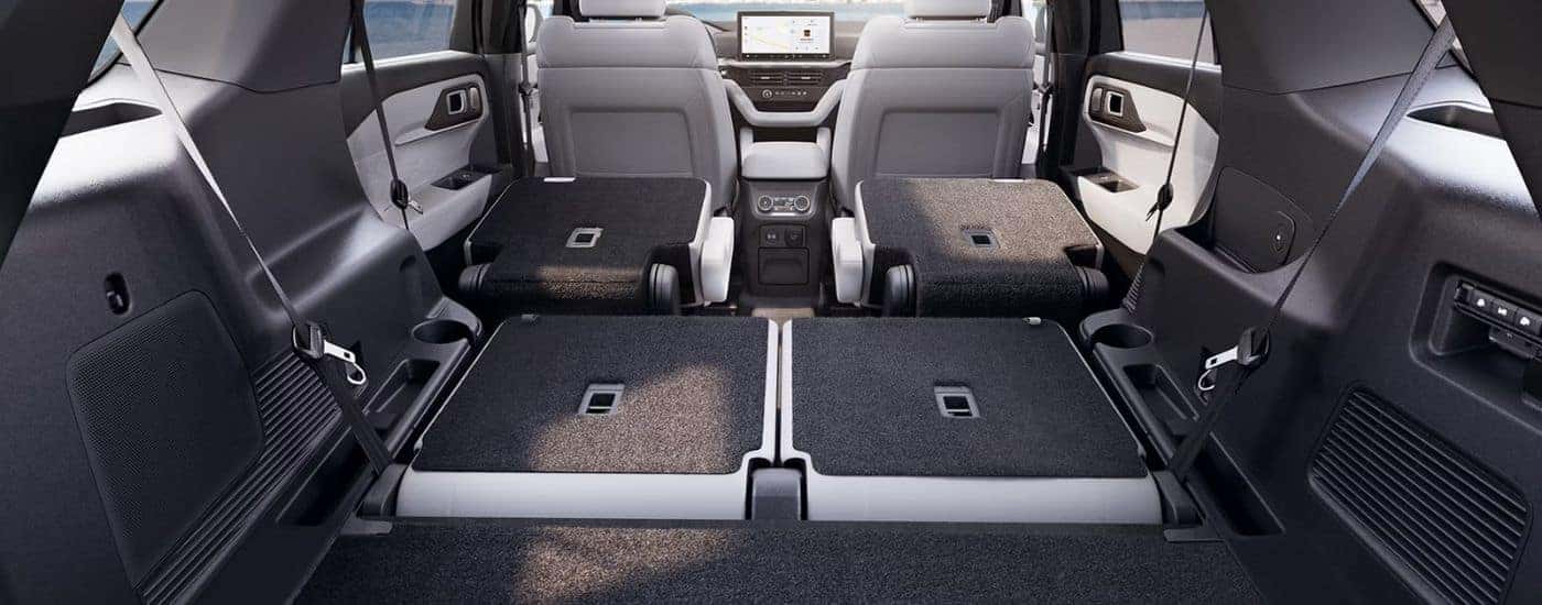 The view from the cargo area of a 2027 Ford Explorer.