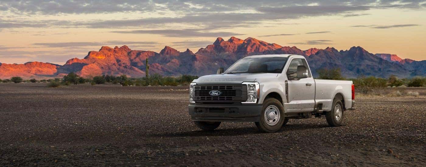 A white 2027 Ford F-350 XL parked off-road.