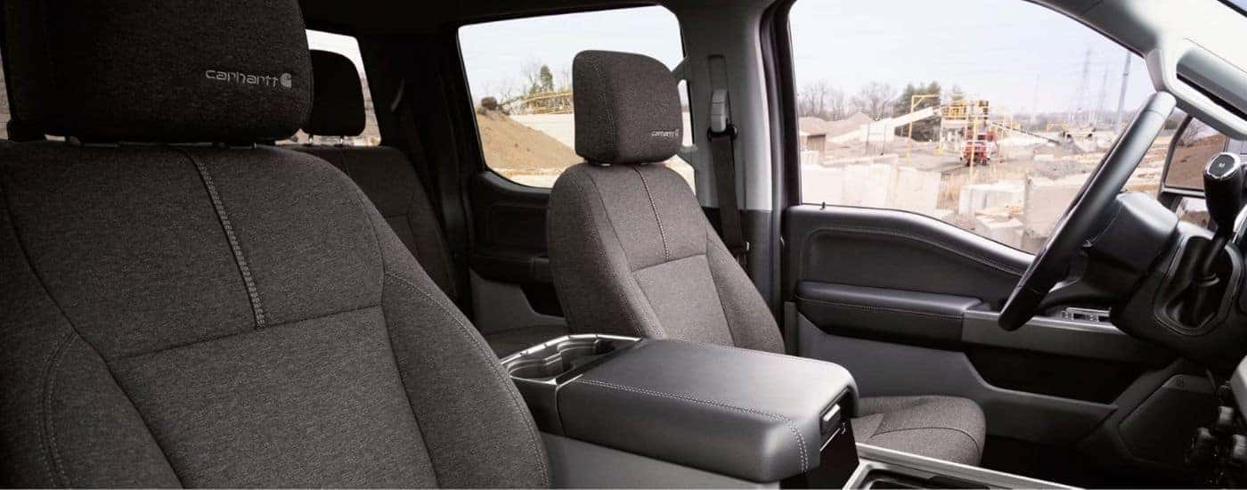 Dark gray interior of a 2027 Ford F-350 XLT with Carhartt Package.