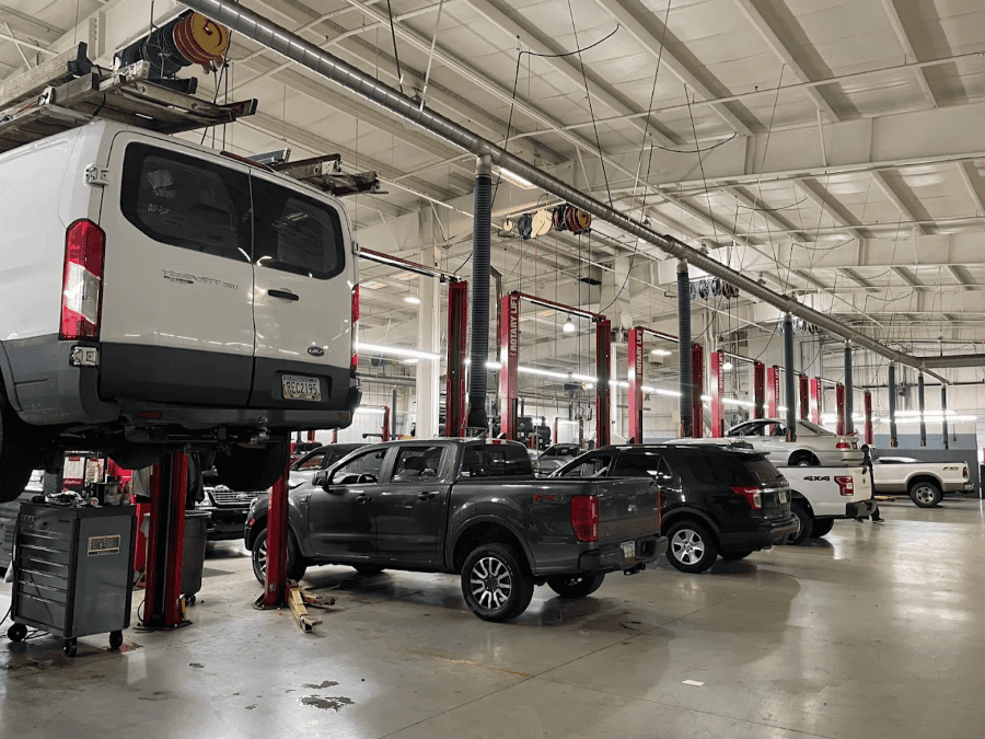 Ford vehicles lined up in a Service center waiting for scheduled service.