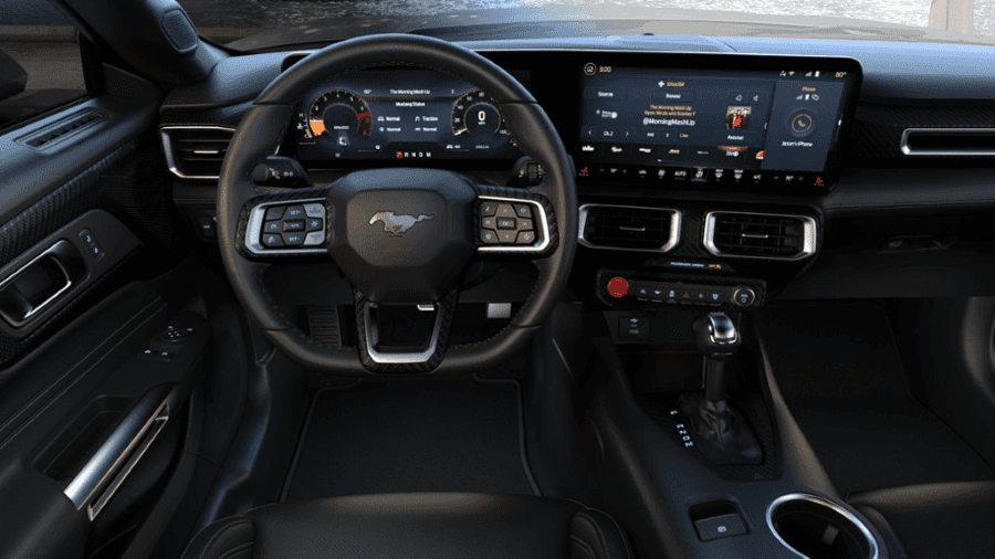 2025 Ford Mustang sports car parked outside Atlanta, GA dealership