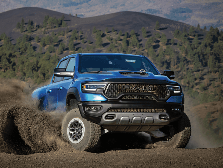 Ram Truck driving in dirt