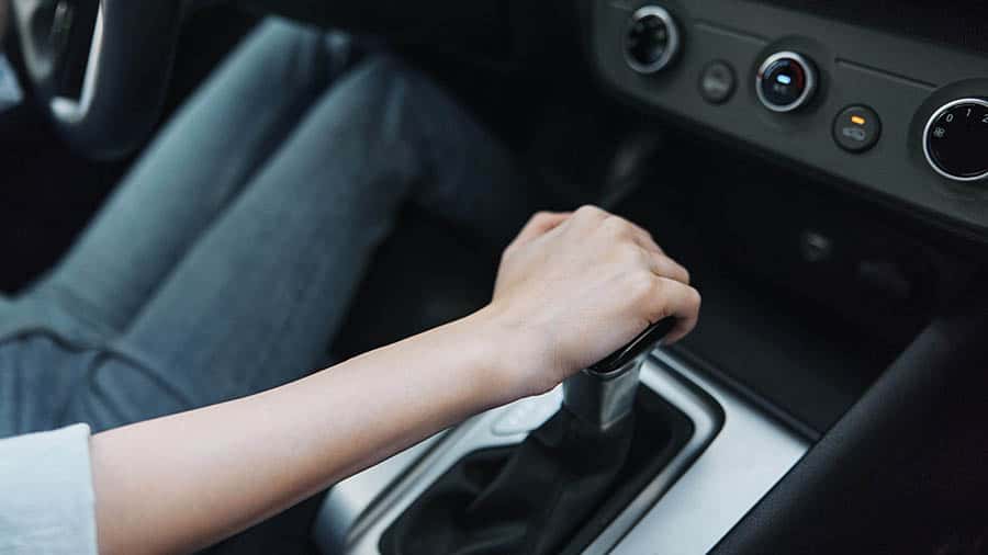 Hand on Gear in Car