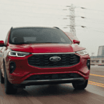 Red 2026 Ford Escape cruising