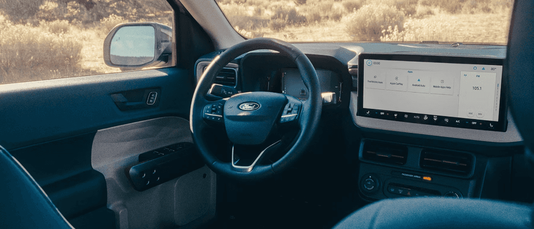2026 Ford Maverick interior showing steering wheel and large touchscreen display