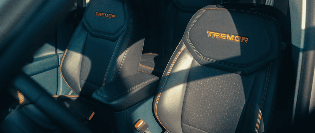 2026 Ford Maverick Tremor seats with orange stitching and Tremor logo