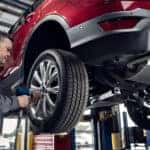Ford service technician working on wheels