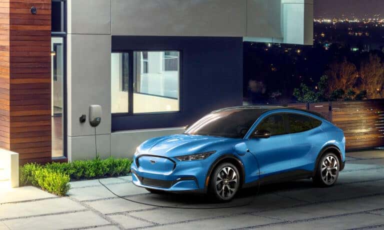 2023 Ford Mustang Mach-E Exterior Charging On A Driveway