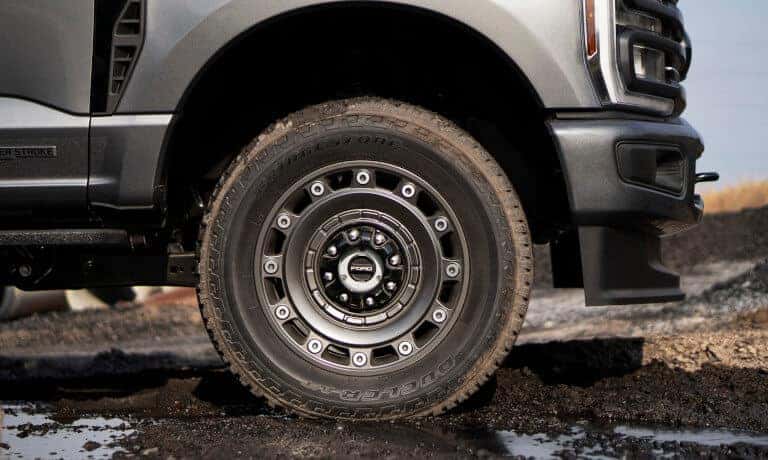 2027 Ford Super Duty front wheel in mud