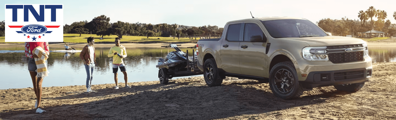 A new and used Ford vehicle lineup at TNT Ford dealership in Red Oak, IA.