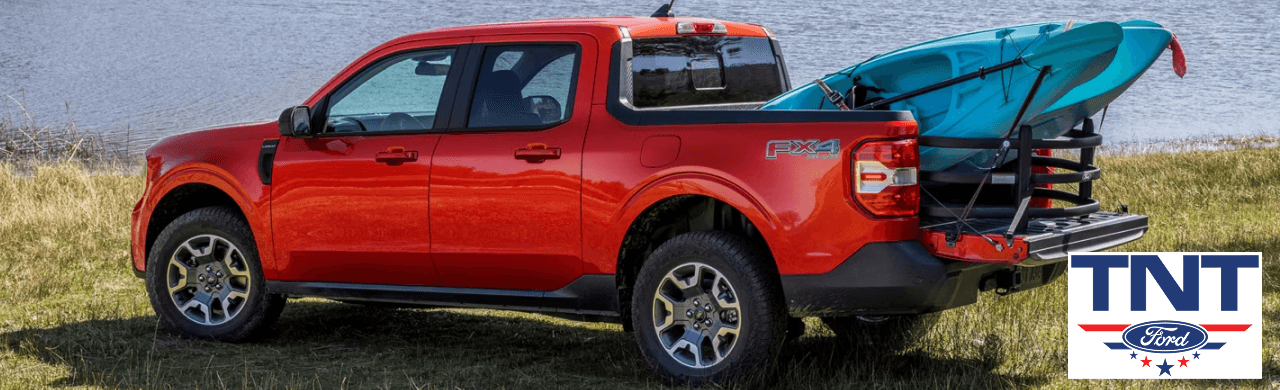 A Ford Maverick Hybrid driving on the highway, showcasing fuel efficiency and style.